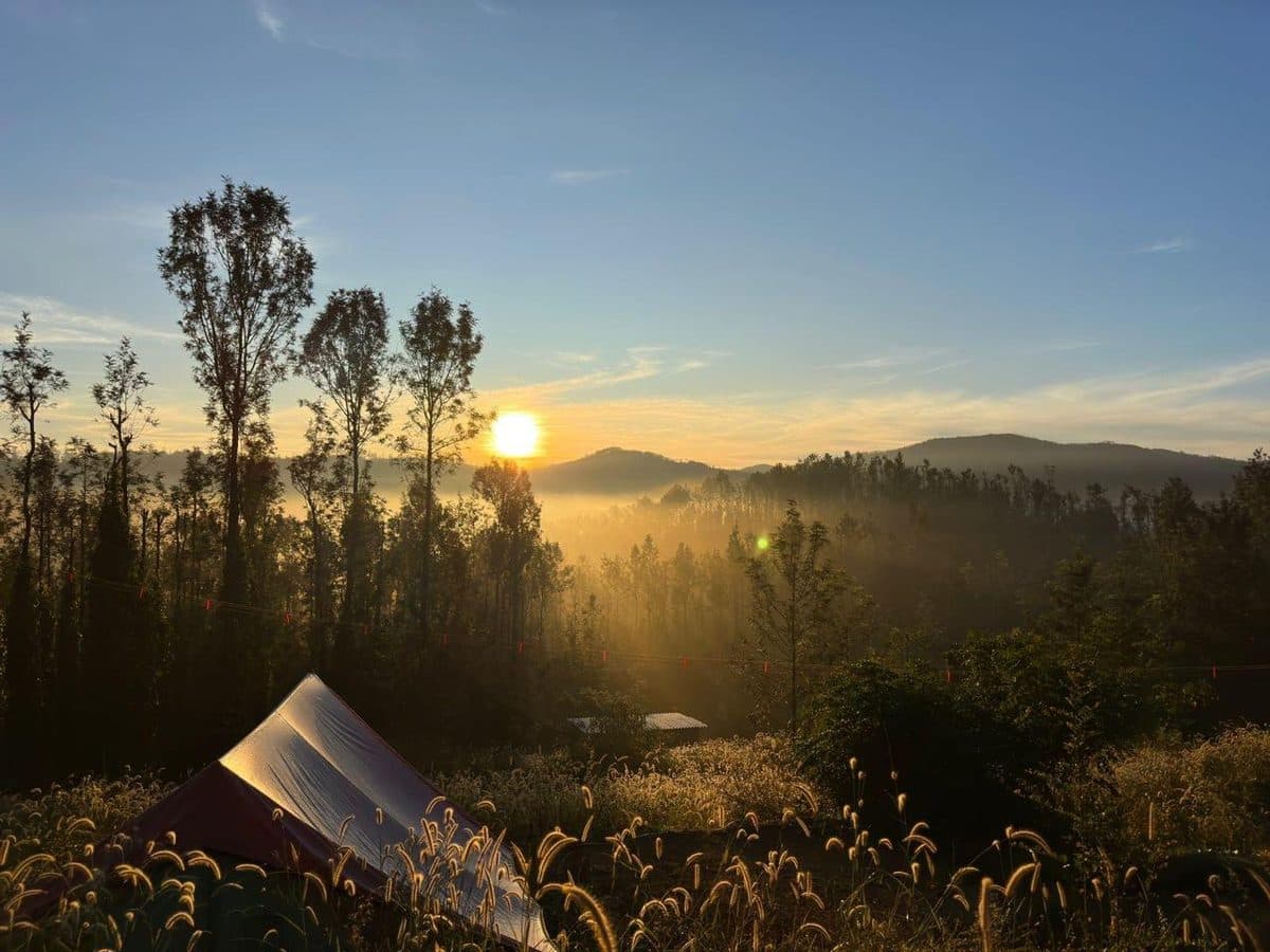 Sunrise over the camp at Kolli Hills, mist in the valley below