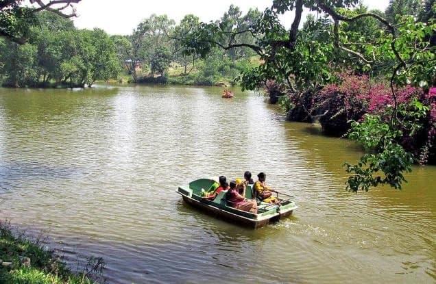 A pedal boat on the quiet end of the boat house lake